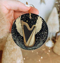 Angelic Harp Wings Ceramic Ornament, Starry Design, Circular Home Decor, Heavenly Gift, Unique Keepsake — photo 1
