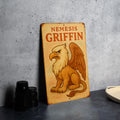 1950s Storybook Tin Sign – Nemesis Griffin Art, Pastel Vintage Metal Wall Decor, Cozy Retro Illustration, Aged Edges — photo 1
