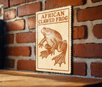 African Clawed Frog Metal Sign – Vintage Stamp Style Wall Art, Amphibian Decor, Retro Vertical Tin Sign for Home or Garden — photo 1