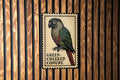 Green-Cheeked Conure Metal Sign – Vintage Stamp Style Bird Wall Art for Home, Aviary, or Pet Lover Décor — photo 1