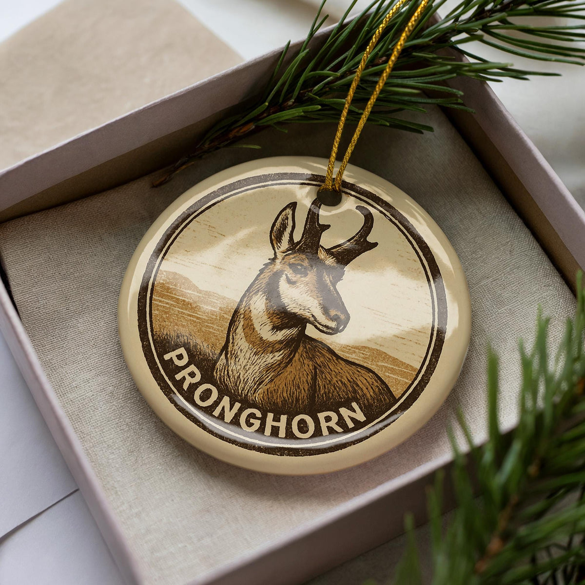 Pronghorn Ceramic Ornament – Circular Wildlife Stamp Art, Rustic Animal Christmas Decor, Nature Lover Gift — photo 1