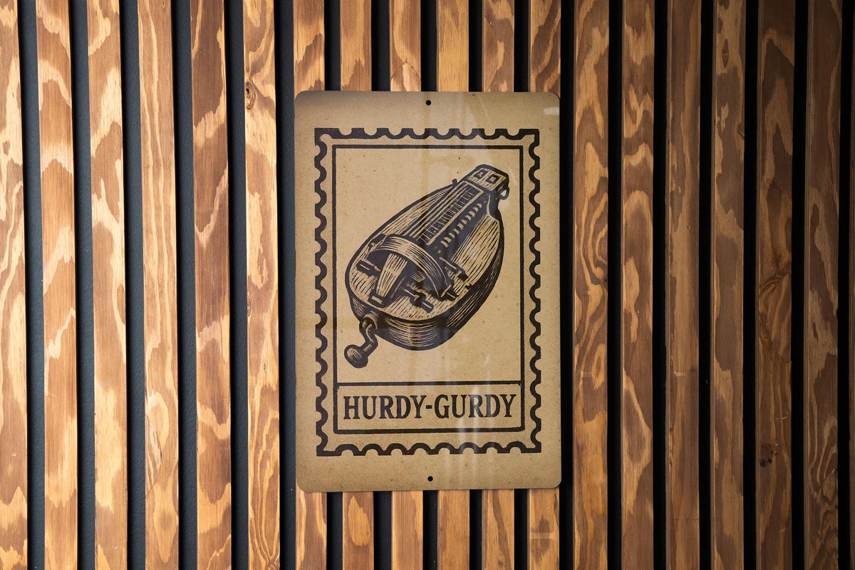 Hurdy-Gurdy Stamp Style Metal Sign – Vintage Music Instrument Wall Art, Rustic Musician Decor, Folk Music Gift — photo 1