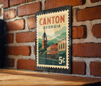 Canton Georgia Metal Sign Featuring Retro Postage Stamp Design with Historic Landmark and Scenic City View — photo 3