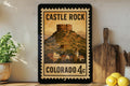 Castle Rock Colorado Metal Sign – Retro Postage Stamp Design Featuring Mountain Town and Scenic Landscape — photo 1