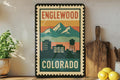 Englewood Colorado Metal Sign – Retro Postage Stamp Design Featuring City Skyline and Iconic Landmarks — photo 1