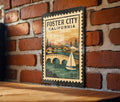 Foster City California Metal Sign – Retro Postage Stamp Design Featuring Coastal Cityscape and Scenic Landmarks — photo 1