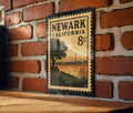 Newark California Metal Sign – Retro Postage Stamp Design Featuring Cityscape and Landmark Theme — photo 1