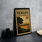 Newark California Metal Sign – Retro Postage Stamp Design Featuring Cityscape and Landmark Theme — photo 4