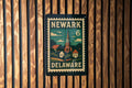 Newark Delaware Metal Sign Featuring Retro Postage Stamp Design with Cityscape and Vintage Travel Theme — photo 1