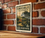 Oakdale California Metal Sign – Retro Postage Stamp Design Featuring Historic Town Landmark and Scenic Landscape — photo 1