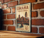 Omaha Nebraska Metal Sign Featuring Retro Postage Stamp Design with Cityscape and Iconic Landmarks — photo 3