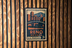 Reno Nevada Metal Sign – Vintage Postage Stamp Design Featuring City Landmarks and Scenic Views — photo 1