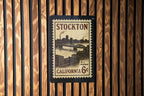 Stockton California Metal Sign – Vintage Postage Stamp Design Featuring City Name and Scenic Elements — photo 1