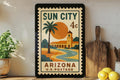 Sun City Arizona Metal Sign Featuring Vintage Postage Stamp Design with Desert Scene and Palm Trees — photo 1