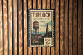 Turlock California Metal Sign – Retro Postage Stamp Design Featuring City Name and Scenic Landmark Elements — photo 1