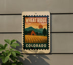 Wheat Ridge Colorado Metal Sign – Retro Postage Stamp Design Featuring Cityscape and Mountain Scene — photo 5