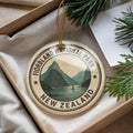 Fiordland National Park New Zealand Ceramic Ornament – Circular Passport Stamp Collage with Iconic Scenic Landmark — photo 1