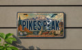Pikes Peak Colorado Metal License Plate Sign, Pikes Peak Travel Poster Style Souvenir Decor, Mountain Landmark Gift — photo 1